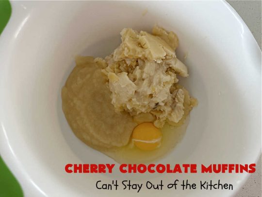 Cherry Chocolate Muffins | Can't Stay Out of the Kitchen | Every sweet tooth craving will be satisfied by one bite of these sensational #muffins. They're filled with #CandiedCherries & miniature #ChocolateChips. #Bananas & #applesauce keep the muffins moist. They're perfect for any #brunch or #breakfast #menu, as snacks to take to sports practices, for #tailgating parties or #potlucks. Everyone will want seconds. #chocolate #cherries #holiday #CherryMuffins #HolidayBreakfast #ChocolateMuffins #CherryChocolateMuffins