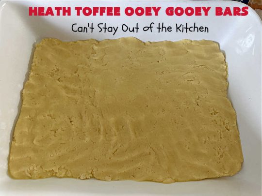Heath Toffee Ooey Gooey Bars | Can't Stay Out of the Kitchen | These #OoeyGooeyBars are outrageously good! If you want an earth-shattering experience, bake up a batch of these lovely #brownies for your next #tailgating party, potluck or backyard BBQ. This easy #recipe uses only 6 ingredients! #cookies #dessert #HeathEnglishToffeeBits #HeathToffee #HeathToffeeOoeyGooeyBars